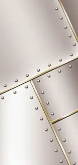 Metallic mobile wallpaper with rivet design in silver and gold tones.