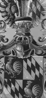 Monochrome heraldic crest with roosters and ornate details in grayscale.