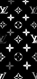 Monochrome luxury pattern wallpaper with iconic symbols on a black background.