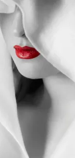 Monochrome wallpaper with vivid red lips and elegant design for mobile phones.