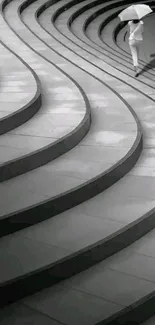 Monochrome steps with spiral design and umbrella-wielding figure.