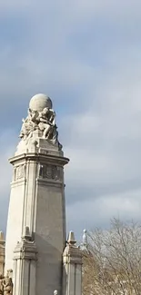 Elegant monument against a cloudy sky.