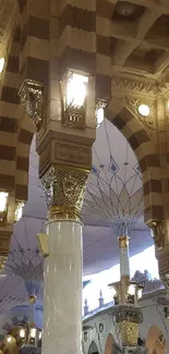 Intricate mosque interior with elegant columns and arches.