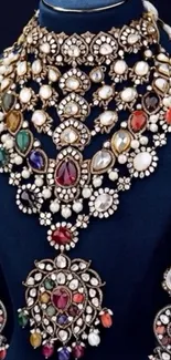 Multicolor gemstone necklace on display stand.