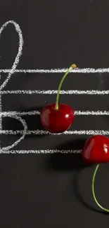 Cherries on chalk-drawn music notes on blackboard.