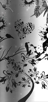 Gray silhouette wallpaper with birds, butterflies, and floral patterns.