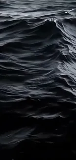 Dark blue ocean waves create a calming mobile wallpaper.