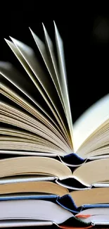 Open book pages create elegant literary wallpaper.