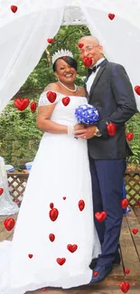 Elegant couple at outdoor wedding ceremony under arch.