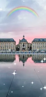Historic palace mirrored in water under a sunset and rainbow.