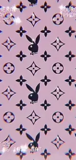 Pink patterned wallpaper with iconic symbols.