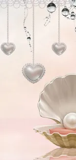 Cream shell with pearl and hanging hearts wallpaper.