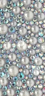 Elegant pearl and gem wallpaper with shimmering details.