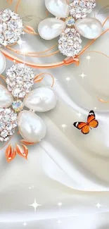 Elegant pearl floral design with a butterfly on silk background.