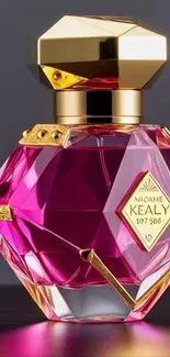 Luxurious pink perfume bottle with gold accents.