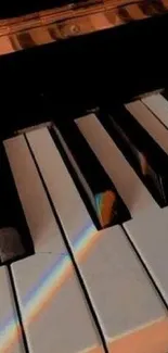 Elegant piano keys with a rainbow reflection.