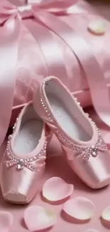 Pink ballet shoes with silk ribbons and floral petals.