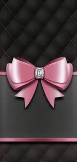 Elegant mobile wallpaper with pink bow and black quilted background.