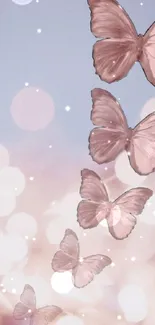 Elegant pink butterflies on soft bokeh background.