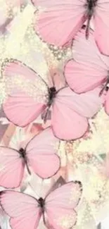 Delicate pink butterflies on soft backdrop.