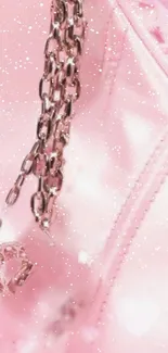 Luxurious pink wallpaper with chains and glitters.