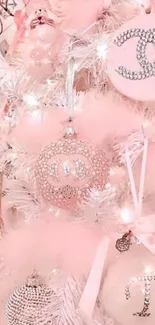 Elegant pink-themed Christmas tree with luxury ornaments.