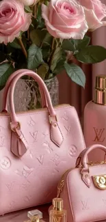 Elegant pink handbags and perfumes with roses, showcasing luxury fashion.