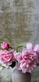 Elegant pink roses in a rustic vase on a textured olive green background.