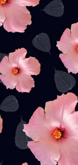 Elegant mobile wallpaper with pink hibiscus flowers on a black background.