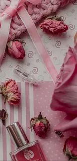 Pink roses and ribbons with perfume bottle wallpaper.