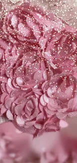 Textured pink floral wallpaper with elegant roses.