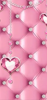 Elegant quilted pink wallpaper with diamond heart embellishments.