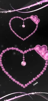 Elegant pink pearl heart design on black background wallpaper.