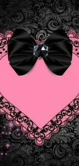 Pink heart with black lace and bow wallpaper design.