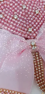 Pink heart and ribbon with pearls design wallpaper.