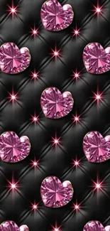 Pink heart gems on luxury black background.
