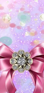 Mobile wallpaper with pink bow and jewel accents.