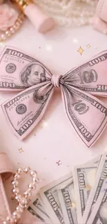 Pink money bow with hundred-dollar bills on luxury accessories.