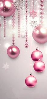 Elegant pink Christmas ornaments wallpaper with snowflakes and baubles.