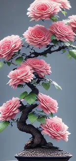 Elegant pink rose bonsai art with delicate blossoms.