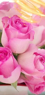 Elegant bouquet of pink roses in a vase with greenery.