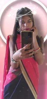 Woman in traditional attire taking a selfie, set against a pink gradient background.