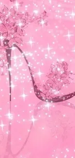 Pink stiletto with floral design and sparkling background wallpaper.