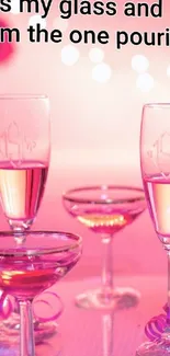 Elegant pink wine glasses on a festive setup.