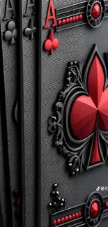 Elegant playing cards with red accents on a black background.