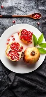 Pomegranate photo on a decorative grey background.