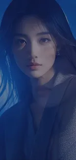 Elegant portrait of a person in blue light.