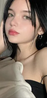 Elegant portrait mobile wallpaper with soft lighting.