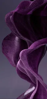 Purple abstract design with flowing curves on a dark background.