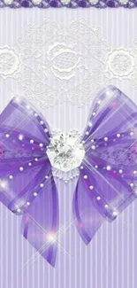 Purple bow with diamond center on lace background wallpaper.